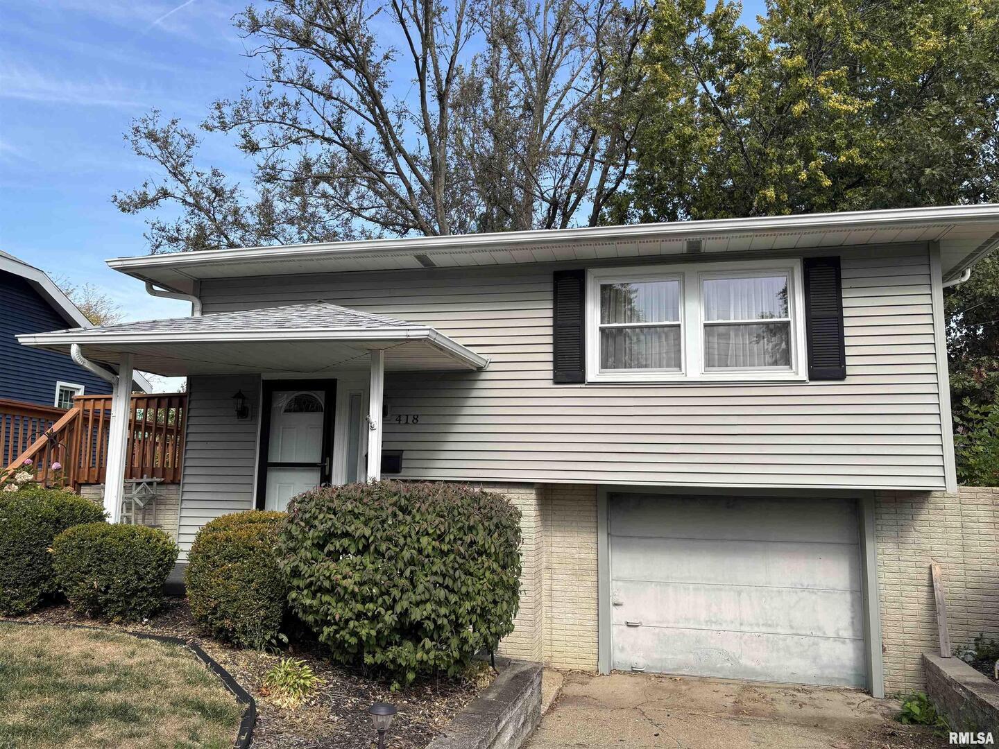418 East Division Street Kewanee, IL 61443 - Photo 2 of 72 a view of a house with a garden