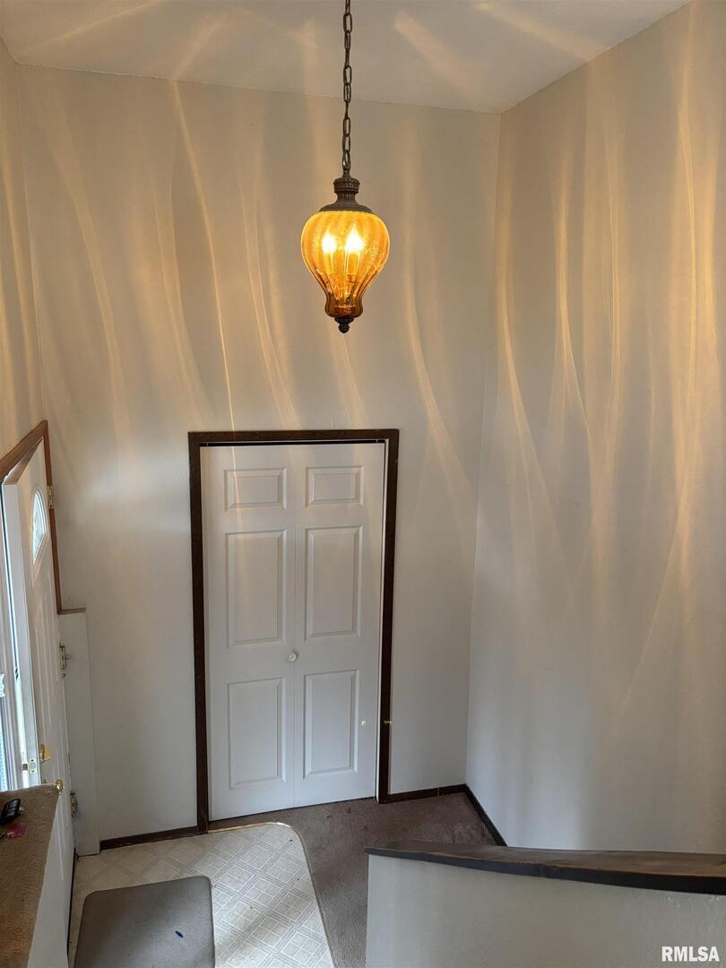 418 East Division Street Kewanee, IL 61443 - Photo 21 of 72 a view of an entryway with a chandelier