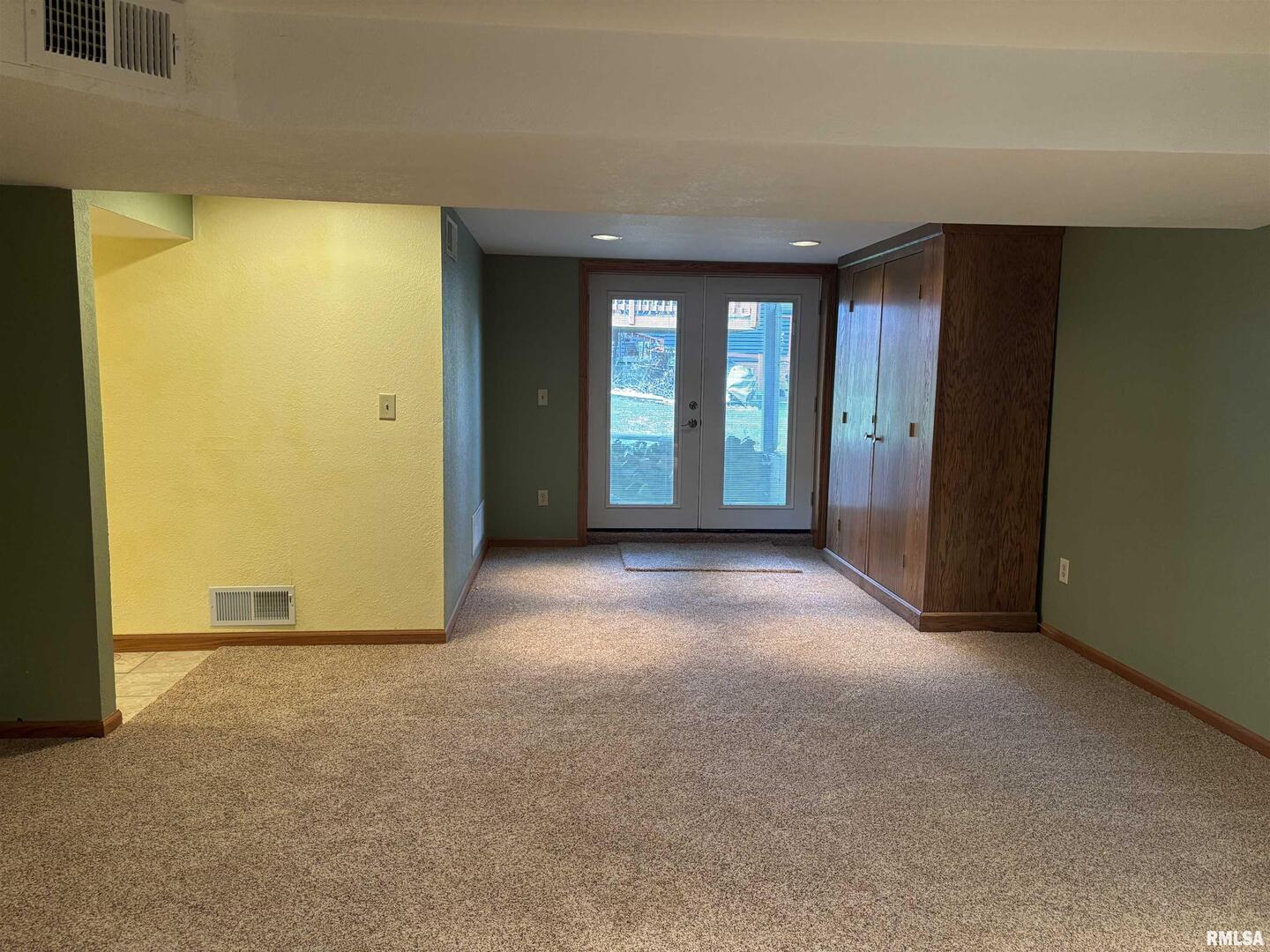 418 East Division Street Kewanee, IL 61443 - Photo 45 of 72 a view of an empty room with window and a kitchen