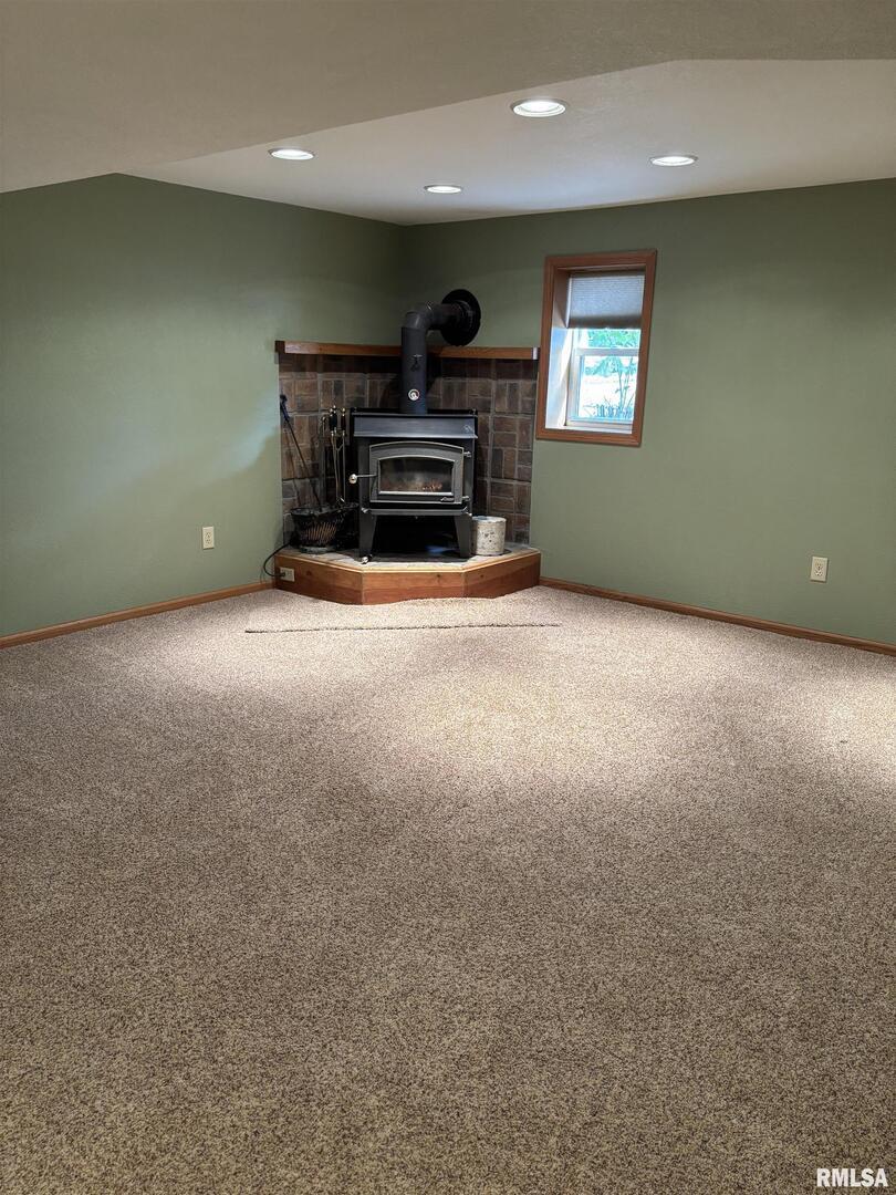 418 East Division Street Kewanee, IL 61443 - Photo 49 of 72 a view of a livingroom with furniture and a fireplace