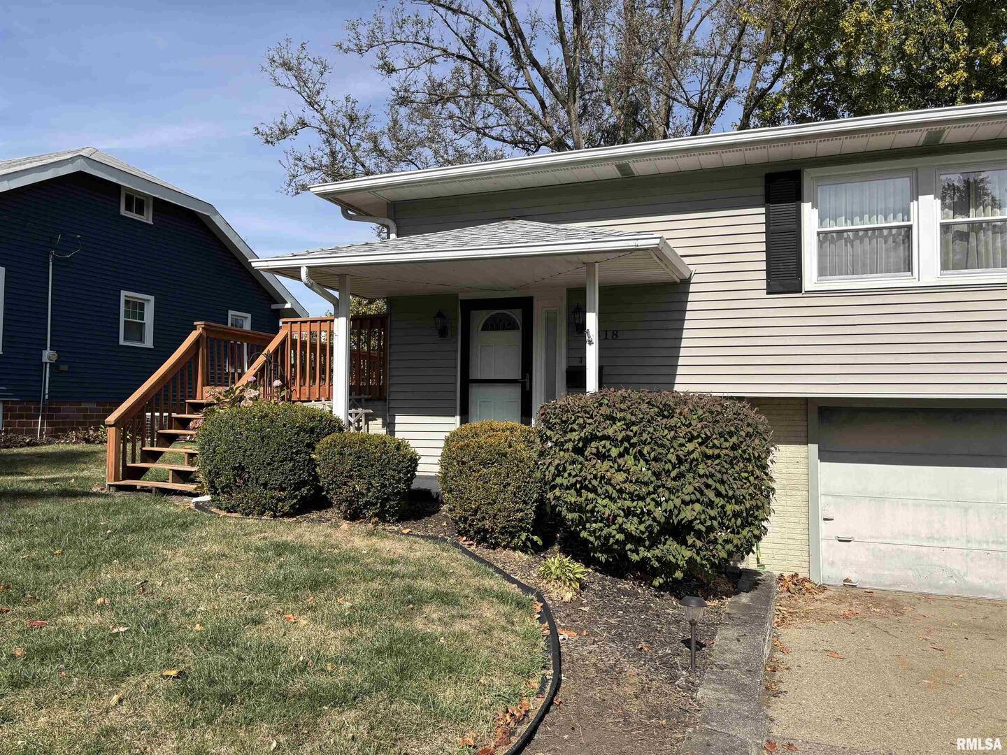418 East Division Street Kewanee, IL 61443 - Photo 68 of 72 a front view of a house with a yard