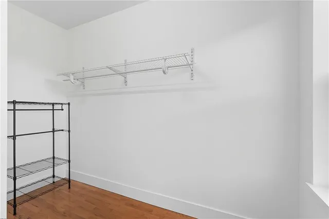 a view of a room with racks on the wall