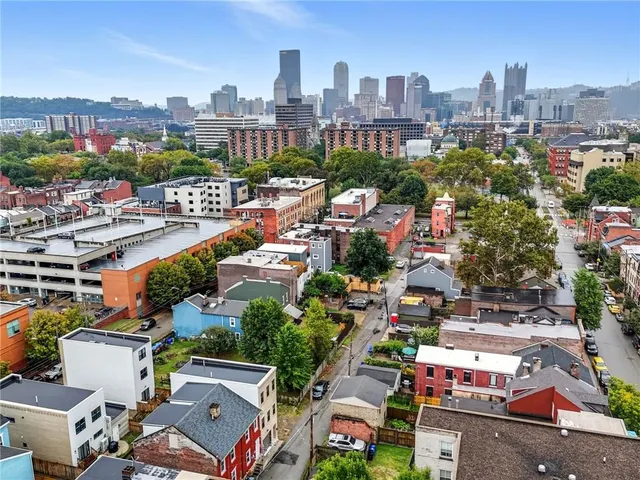 a view of a city with tall buildings