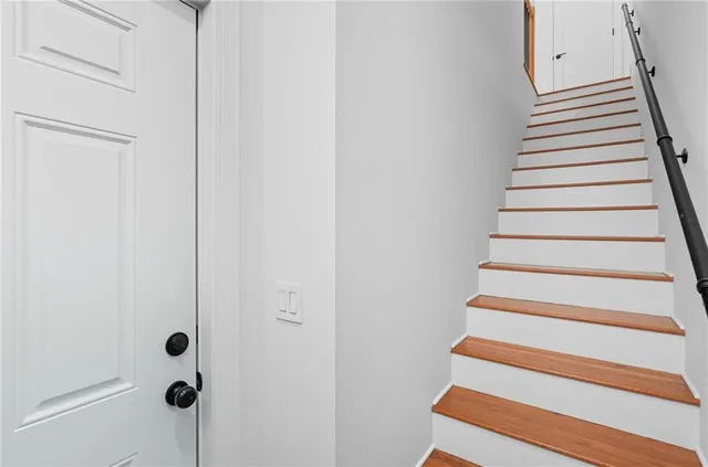 a view of entryway with stairs