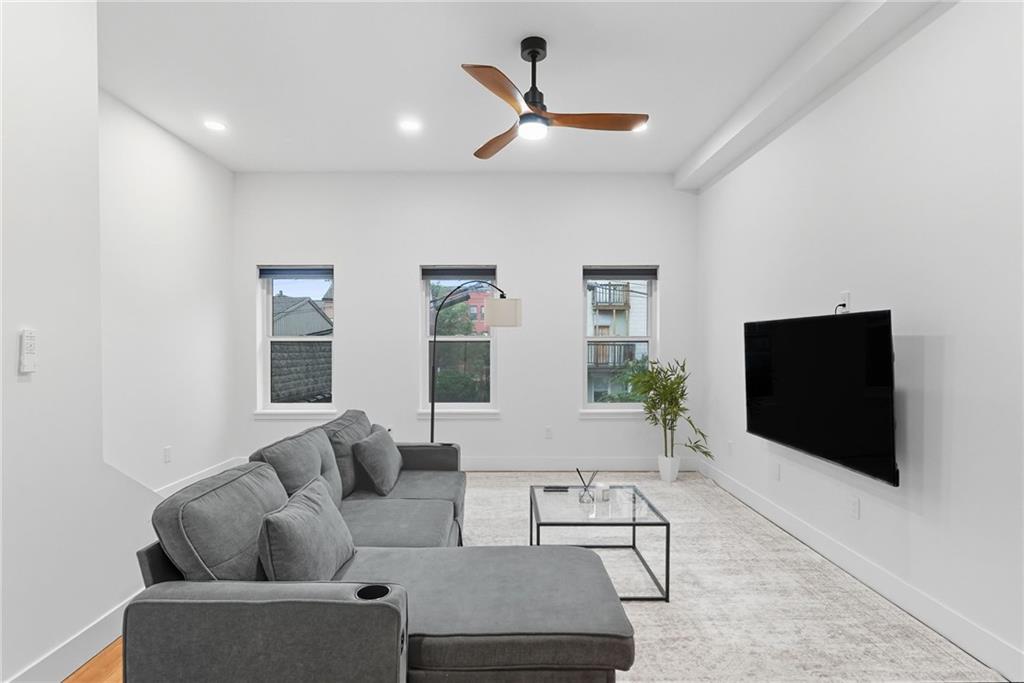 1236 Butterfield Way Pittsburgh, PA 15212 - Photo 8 of 40 a living room with furniture and a flat screen tv