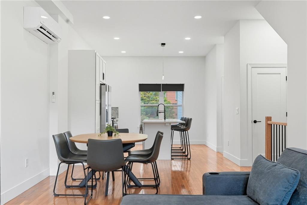 1236 Butterfield Way Pittsburgh, PA 15212 - Photo 10 of 40 a view of a dining room with furniture and a table