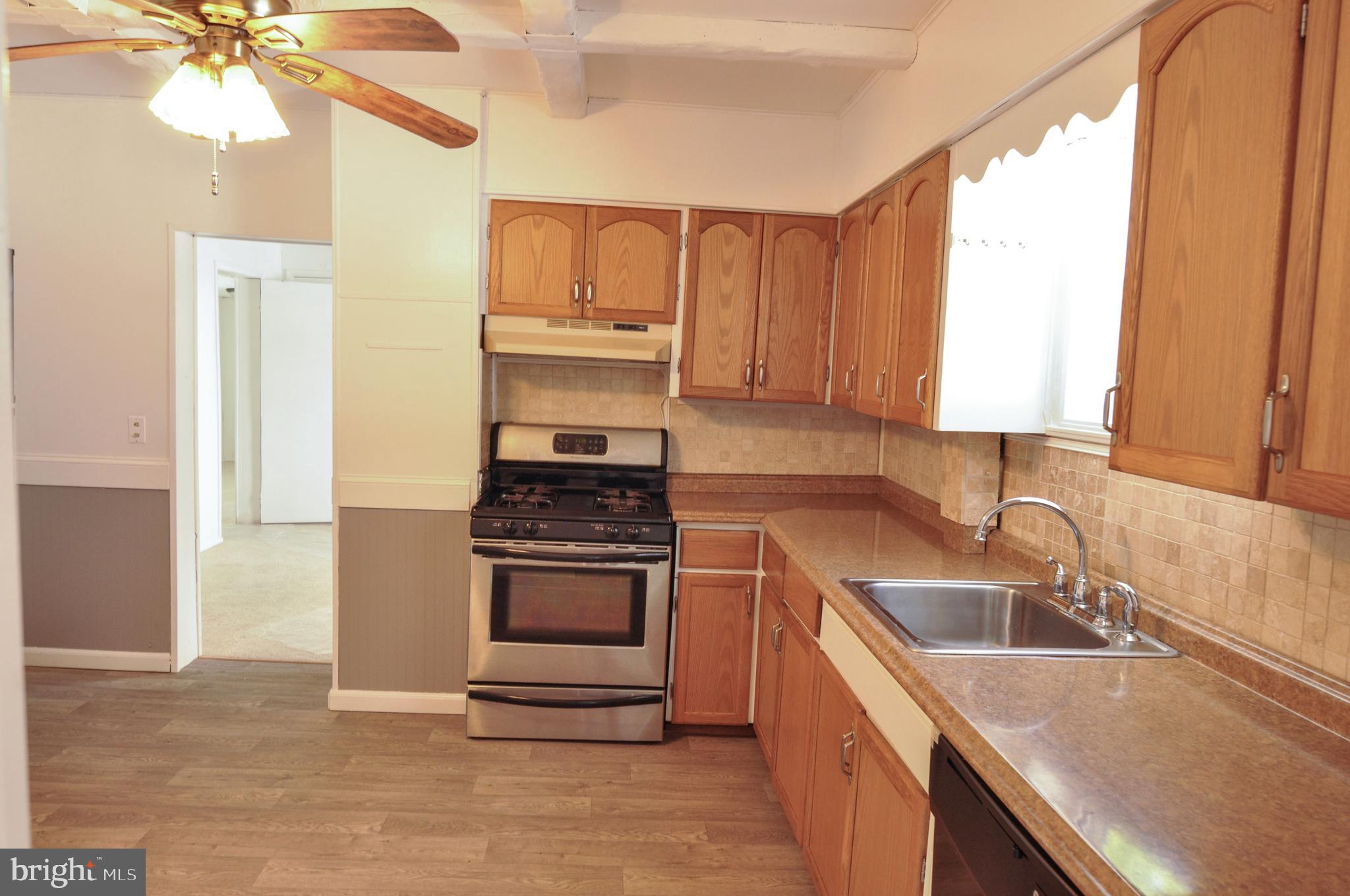 216 Clyde Avenue Baltimore, MD 21227 - Photo 25 of 64 Kitchen, New Flooring