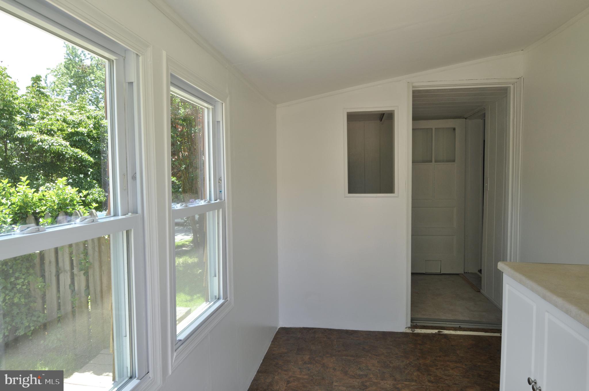 216 Clyde Avenue Baltimore, MD 21227 - Photo 31 of 64 Back Door Entrance to Mudroom