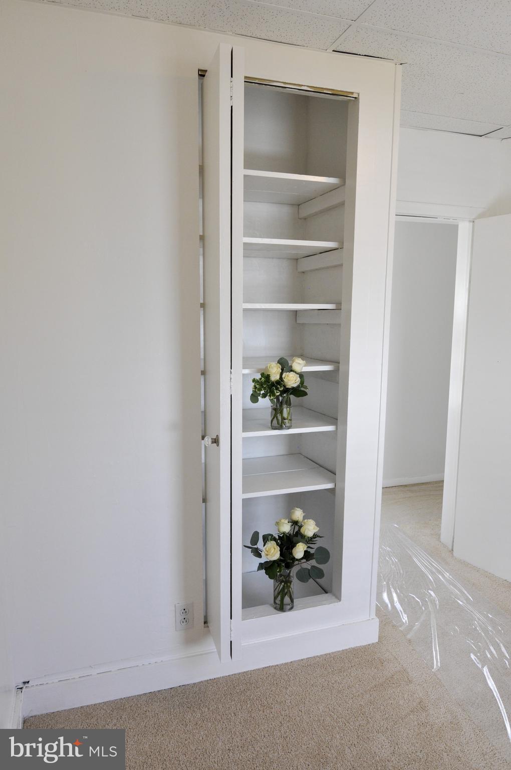 216 Clyde Avenue Baltimore, MD 21227 - Photo 46 of 64 Second Level Middle Bedroom with Built in Shelving