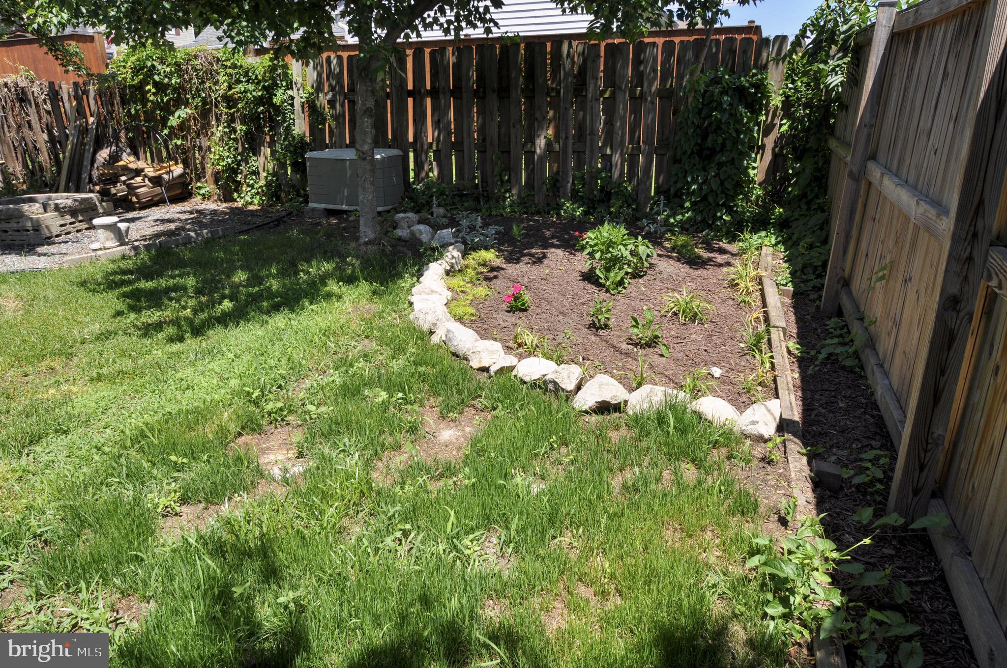 216 Clyde Avenue Baltimore, MD 21227 - Photo 59 of 64 Backyard Flower Garden