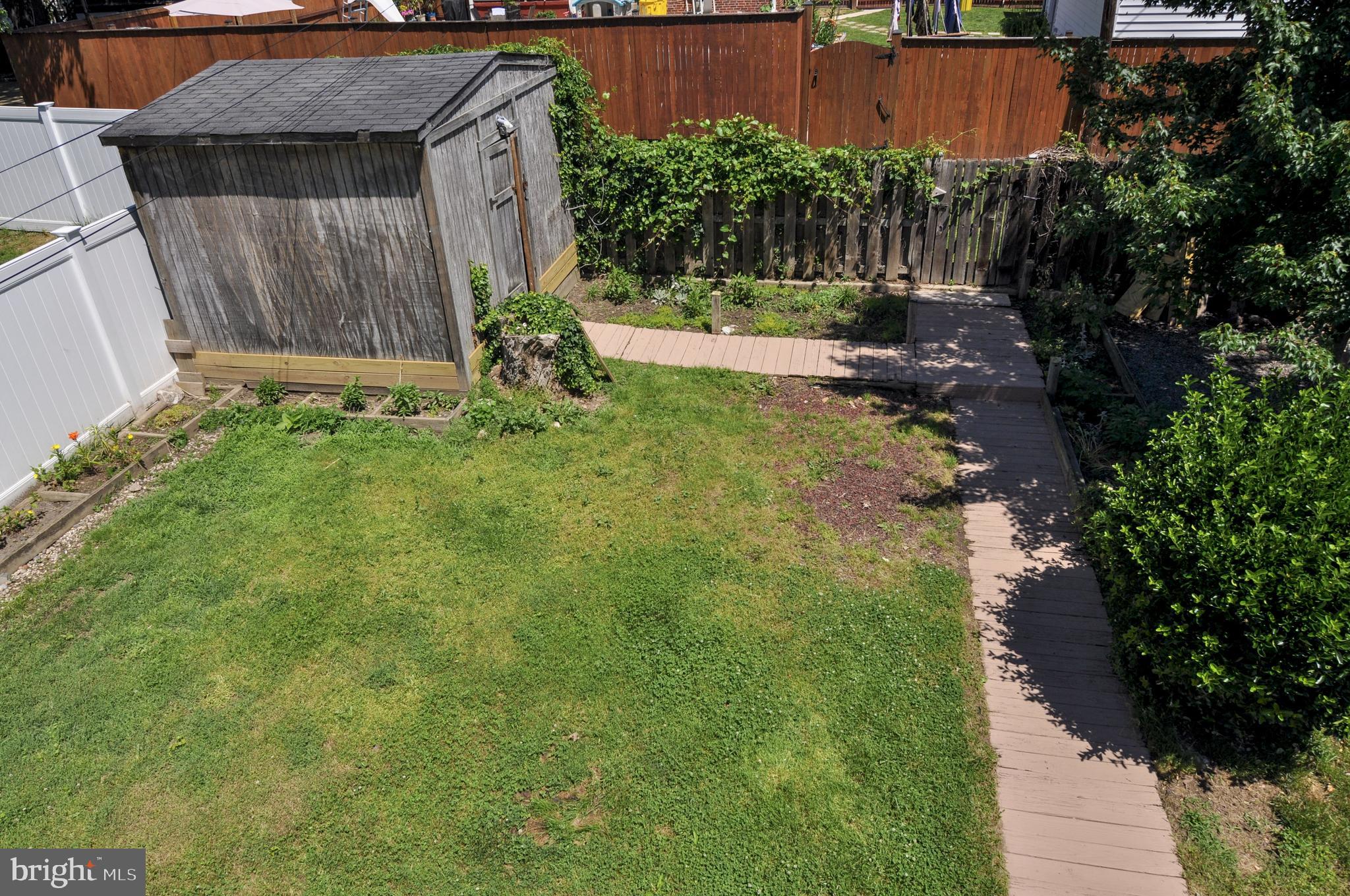 216 Clyde Avenue Baltimore, MD 21227 - Photo 61 of 64 Exterior View of Backyard