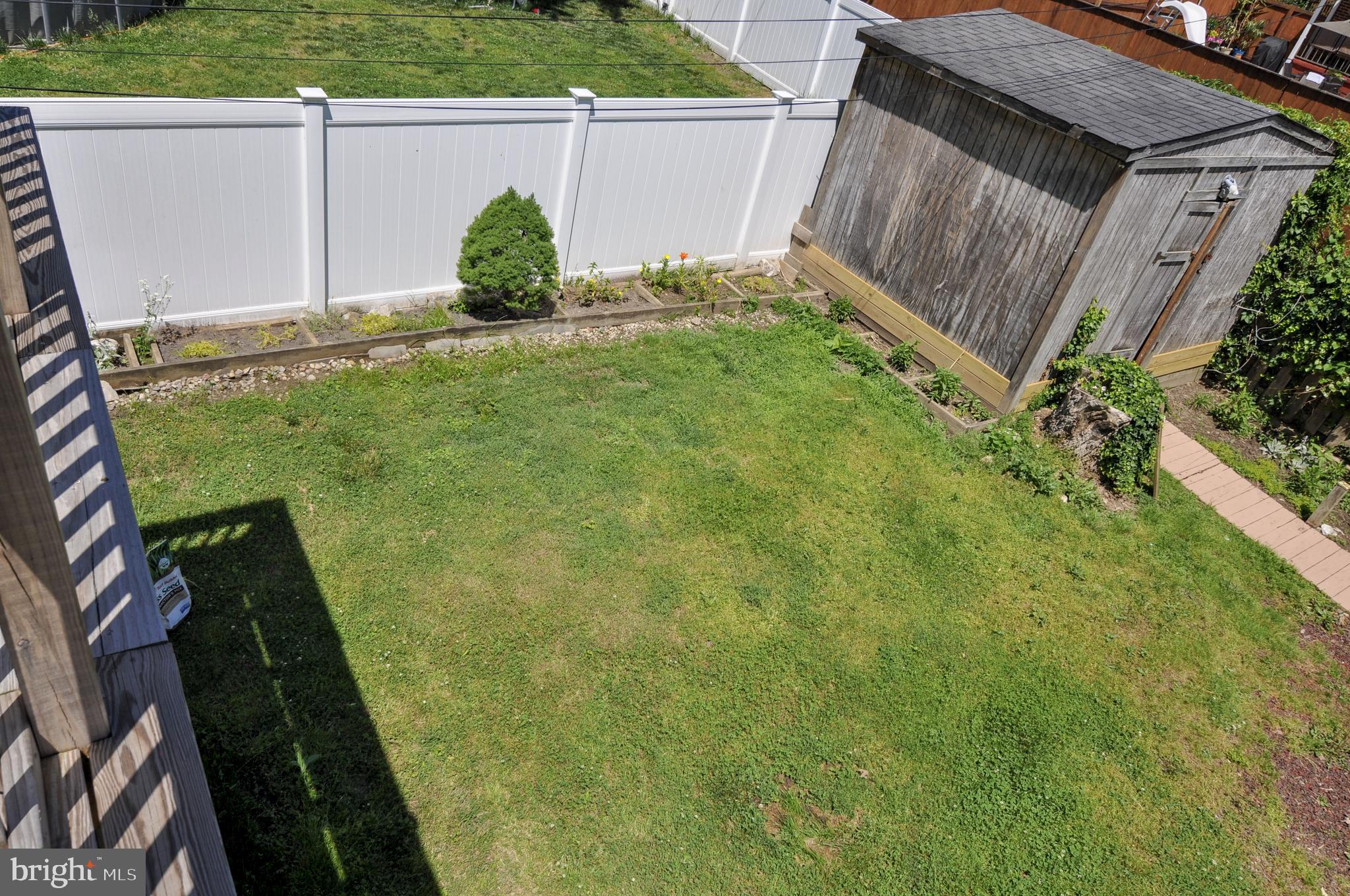 216 Clyde Avenue Baltimore, MD 21227 - Photo 62 of 64 Backyard with Shed