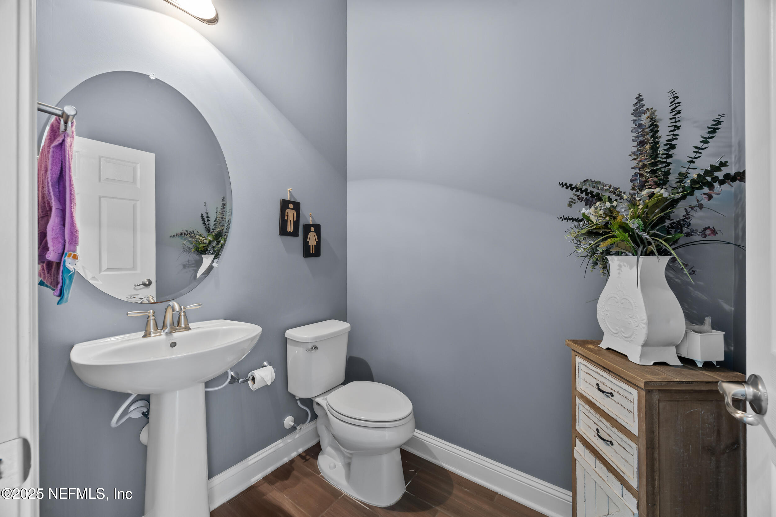 45 Oban Court St. Johns, FL 32259 - Photo 12 of 53 a bathroom with a toilet sink and mirror