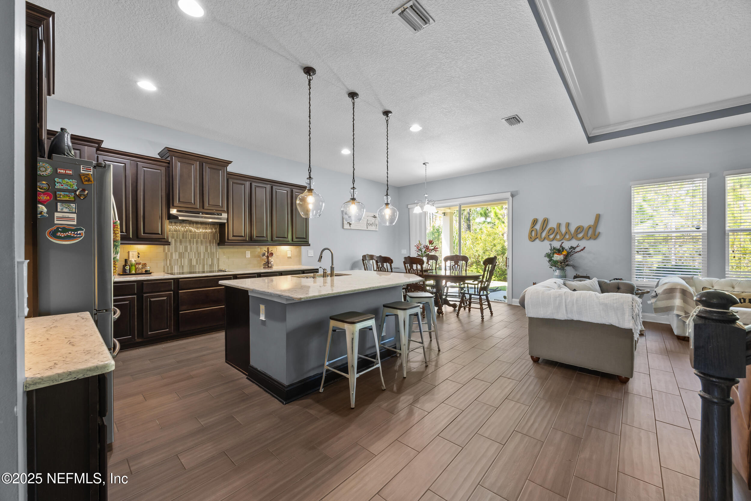 45 Oban Court St. Johns, FL 32259 - Photo 14 of 53 a large kitchen with lots of counter space and stainless steel appliances