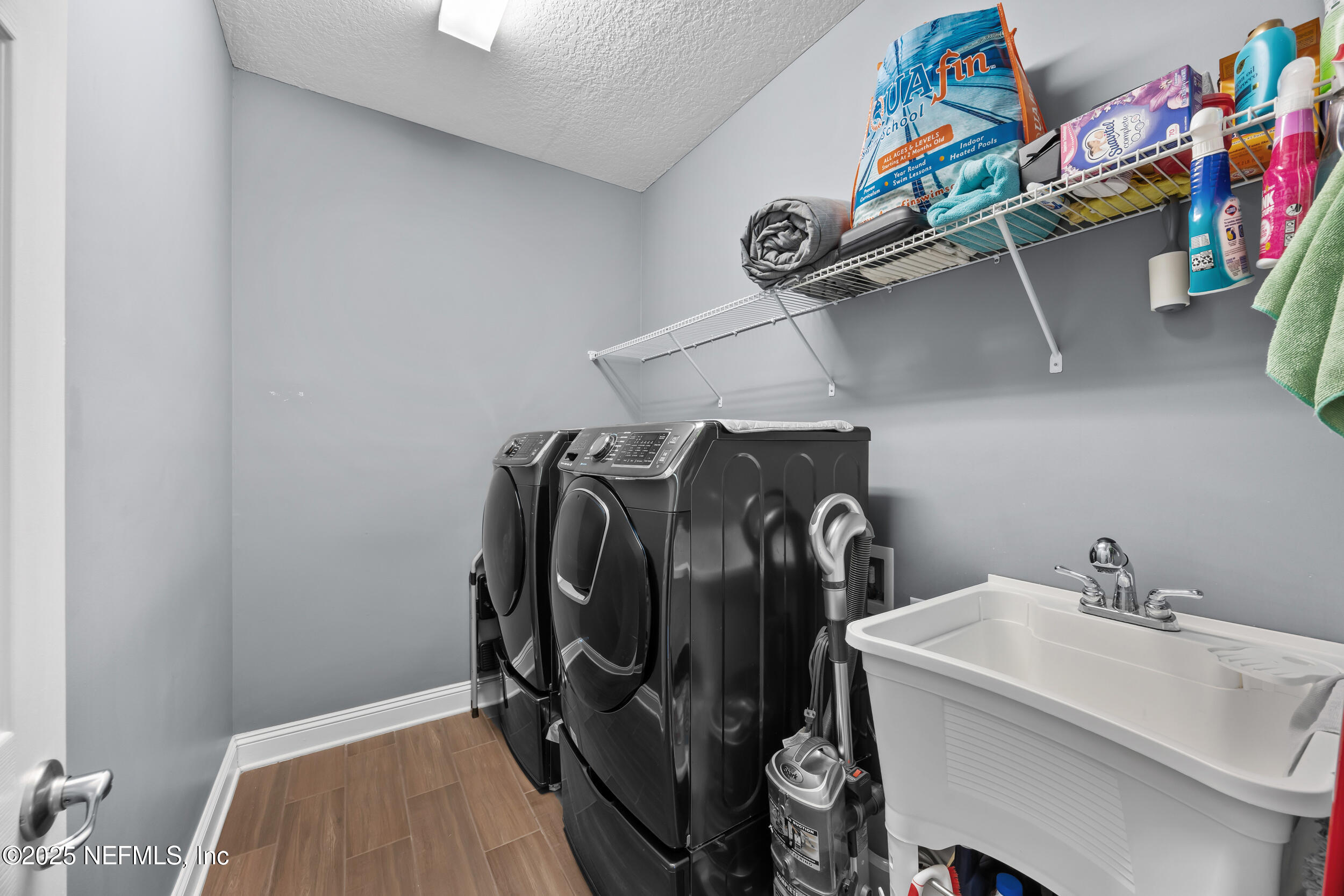45 Oban Court St. Johns, FL 32259 - Photo 26 of 53 a view of storage and utility room with racks on the wall