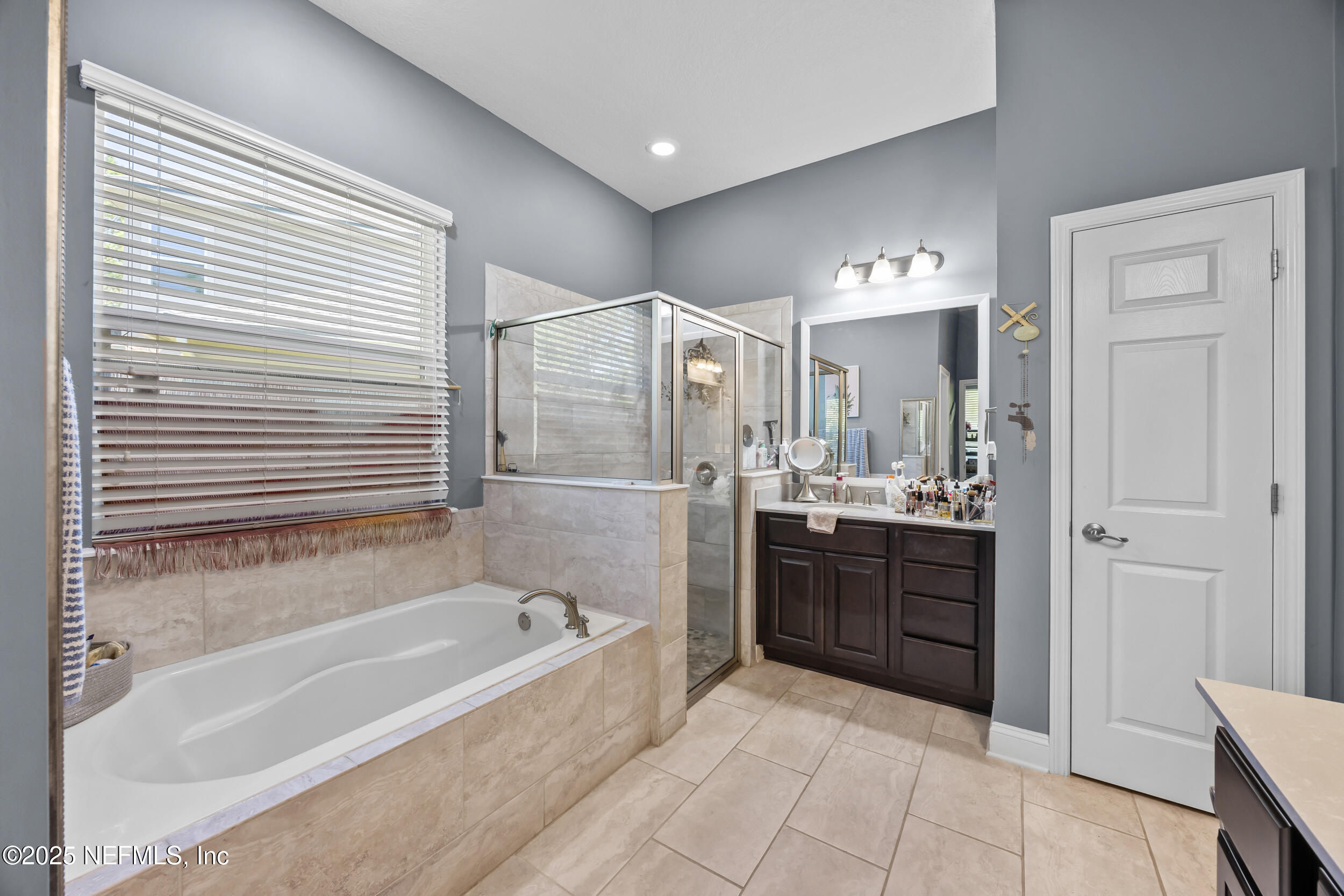 45 Oban Court St. Johns, FL 32259 - Photo 30 of 53 a large spacious bathroom with a tub shower and sink