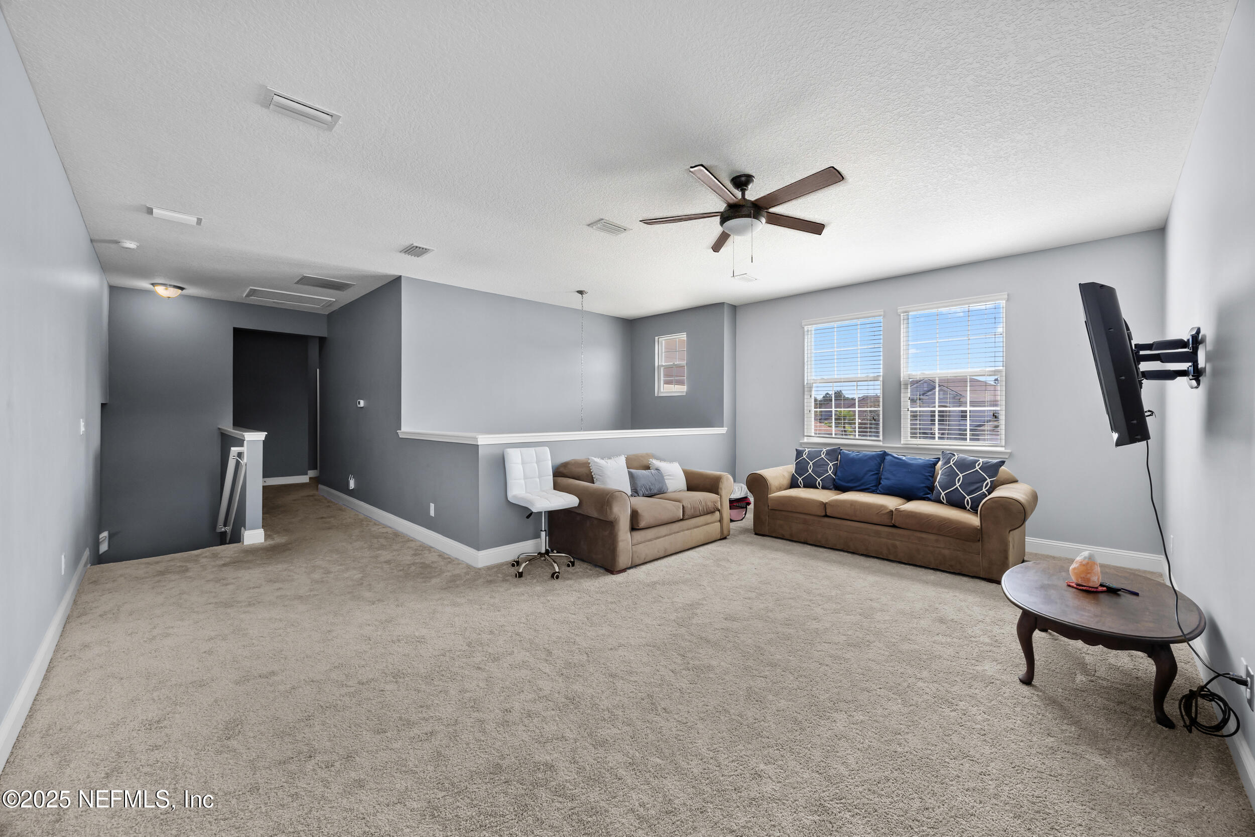45 Oban Court St. Johns, FL 32259 - Photo 33 of 53 a living room with furniture and a window