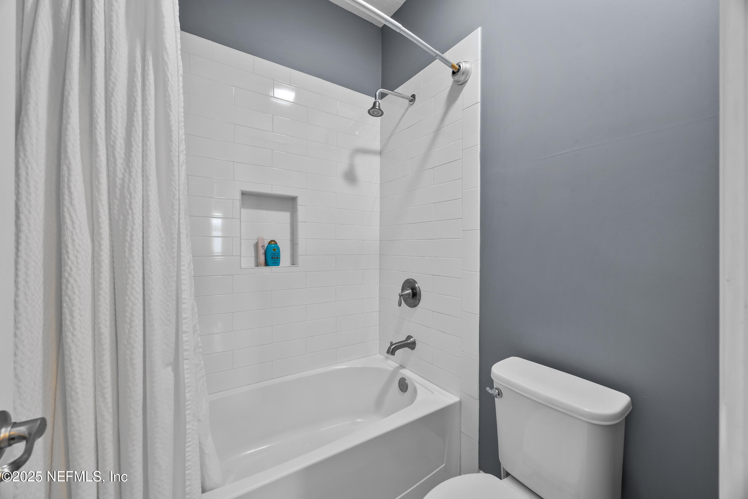45 Oban Court St. Johns, FL 32259 - Photo 36 of 53 a white toilet sitting next to a bath tub