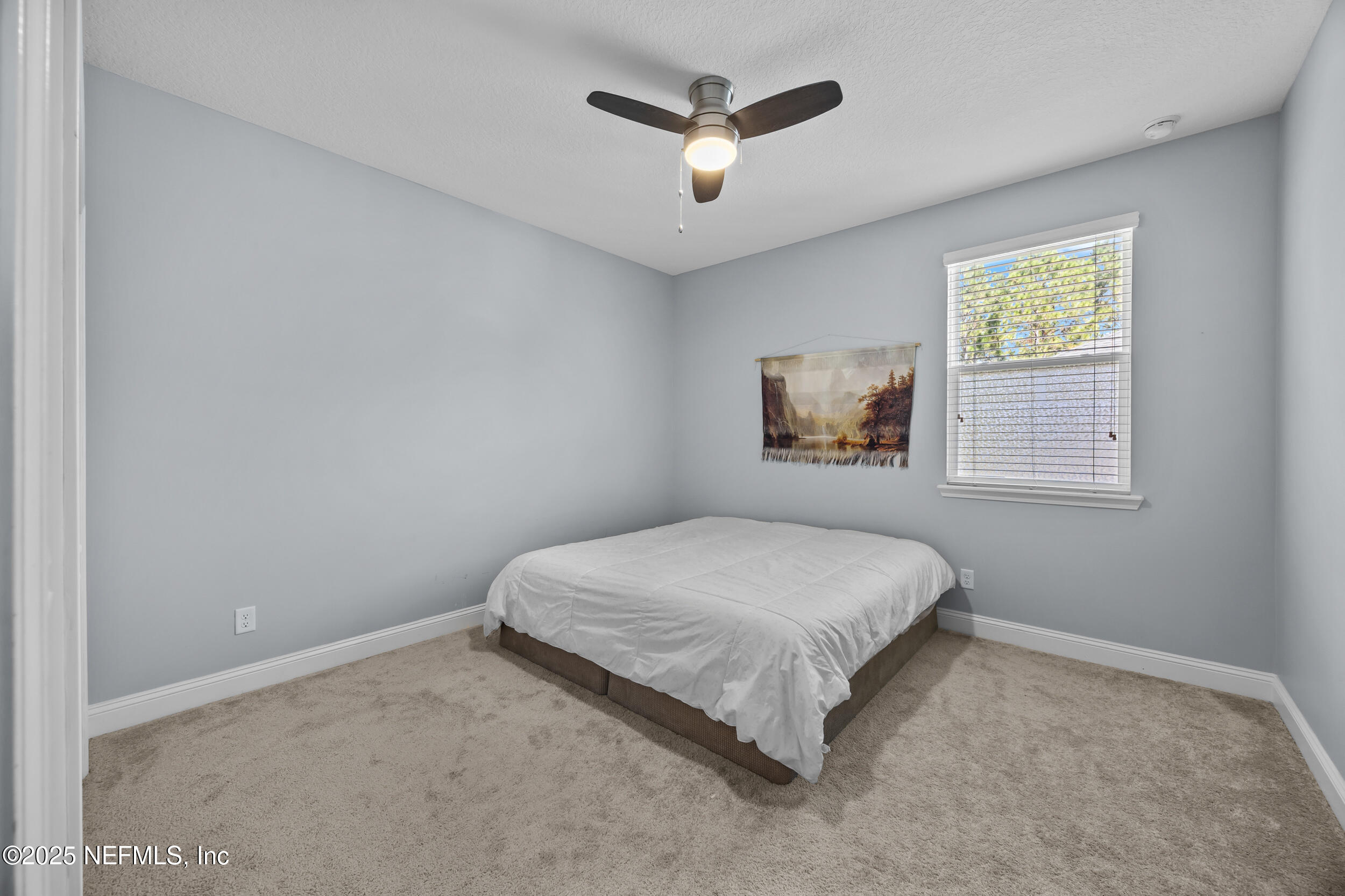 45 Oban Court St. Johns, FL 32259 - Photo 37 of 53 a bedroom with a bed and a window