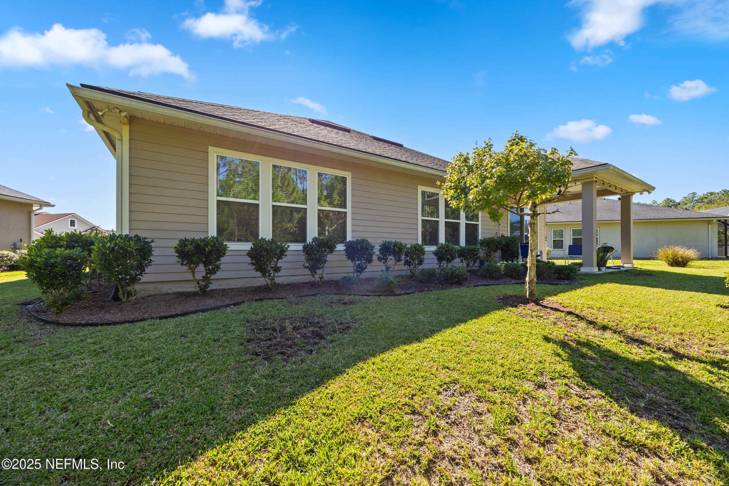 45 Oban Court St. Johns, FL 32259 - Photo 41 of 53 a view of a house with backyard and sitting area