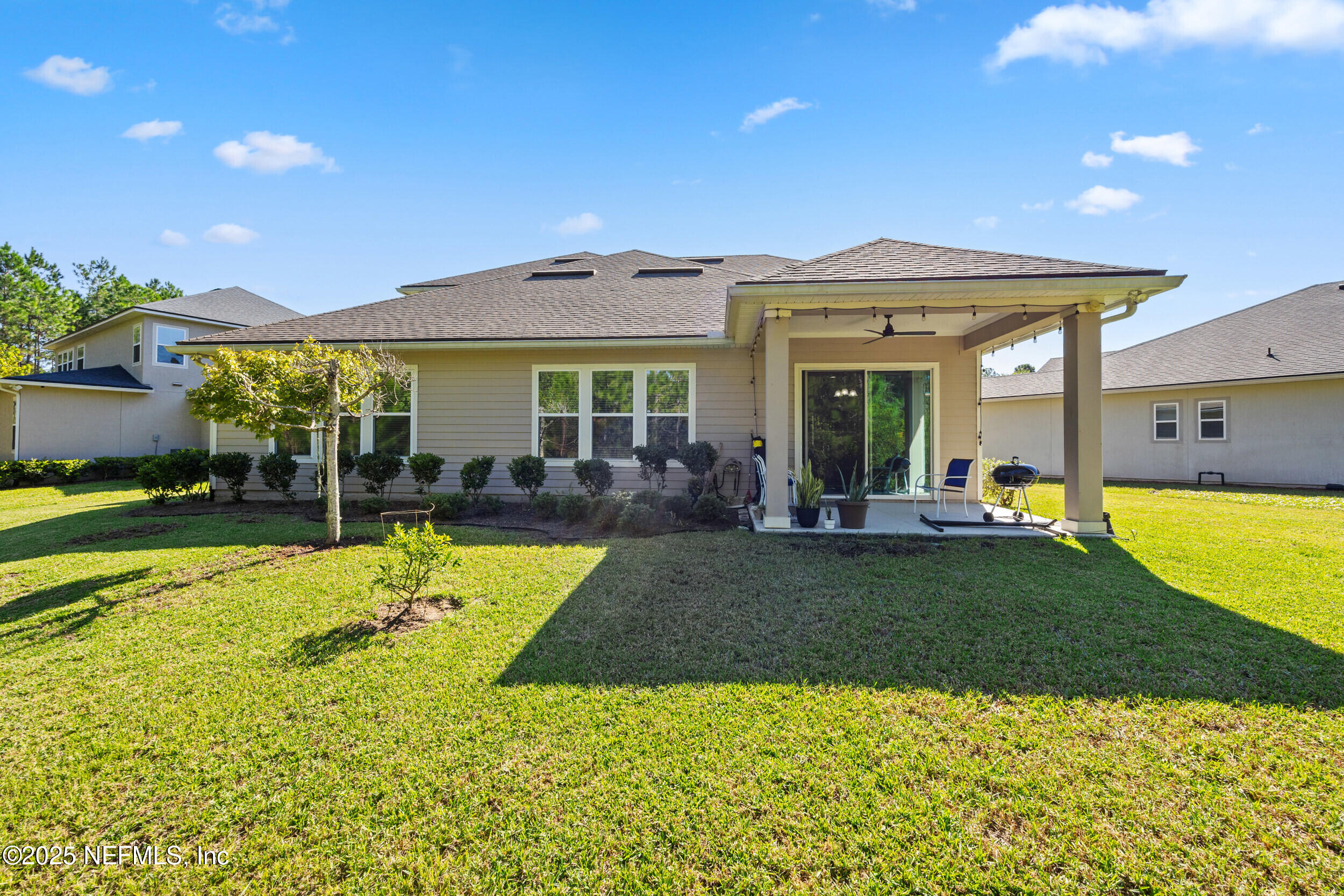 45 Oban Court St. Johns, FL 32259 - Photo 42 of 53 a view of a house with swimming pool and a yard