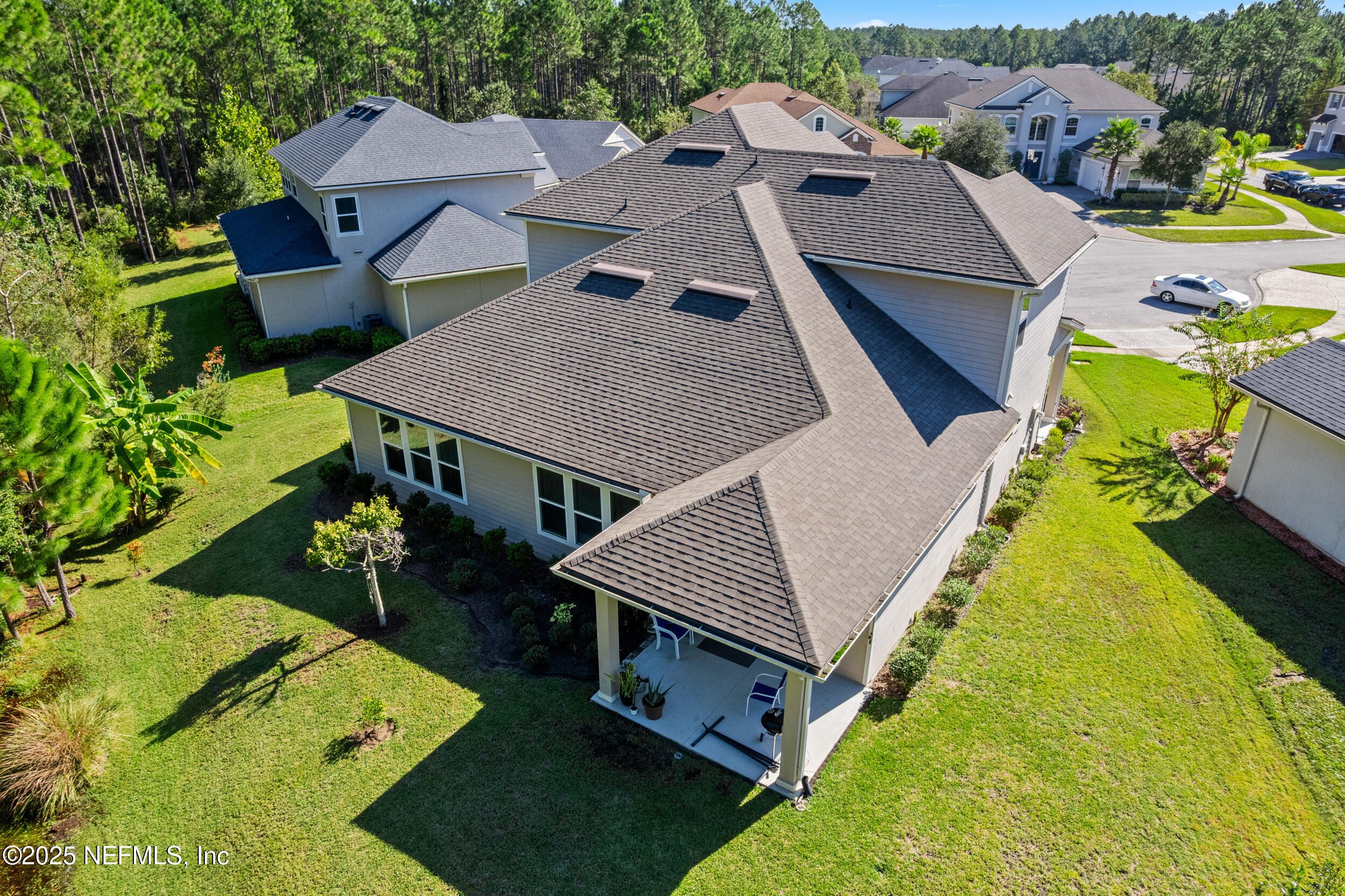 45 Oban Court St. Johns, FL 32259 - Photo 48 of 53 an aerial view of a house with a yard swimming pool a patio and yard