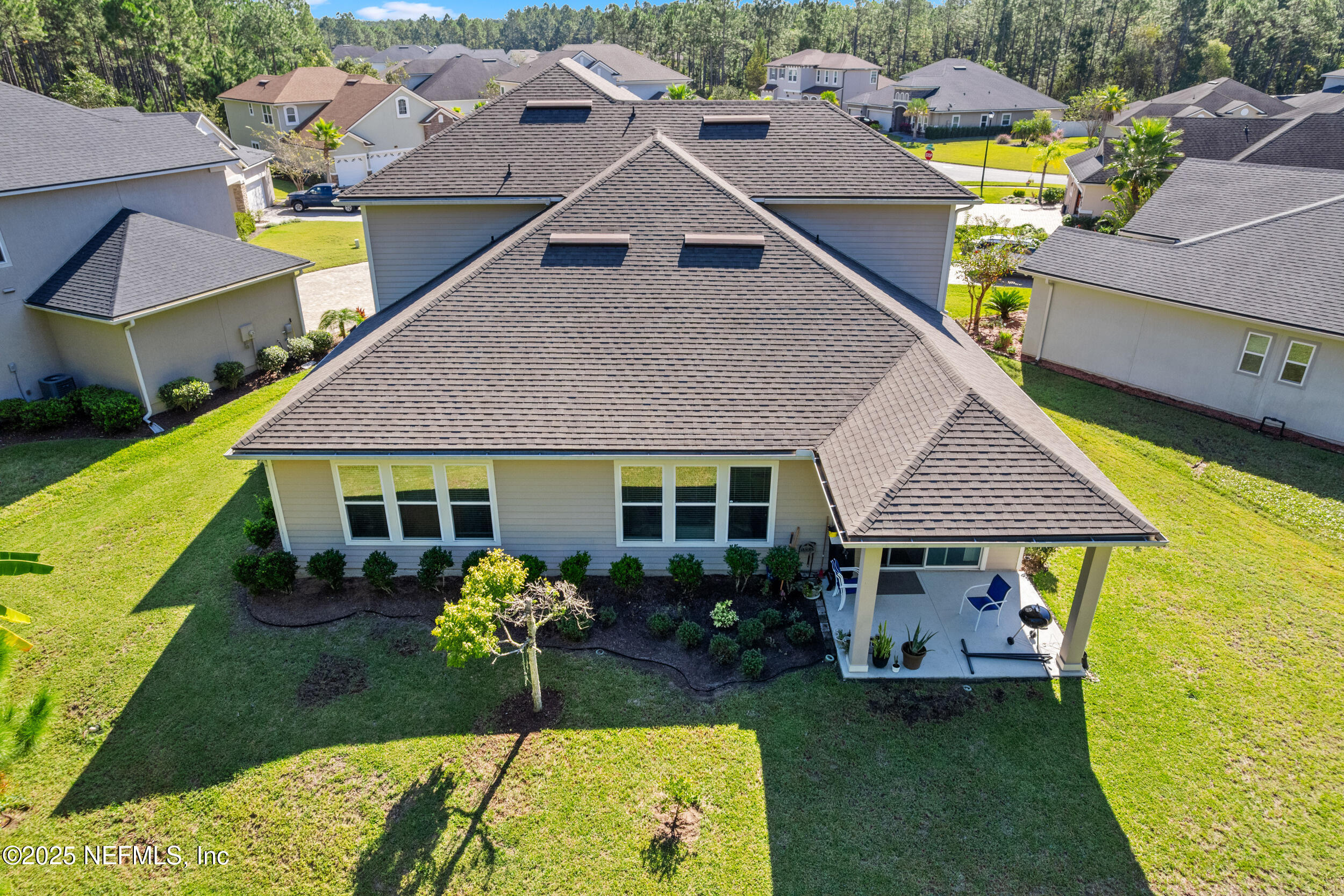 45 Oban Court St. Johns, FL 32259 - Photo 50 of 53 a aerial view of a house with swimming pool garden and patio