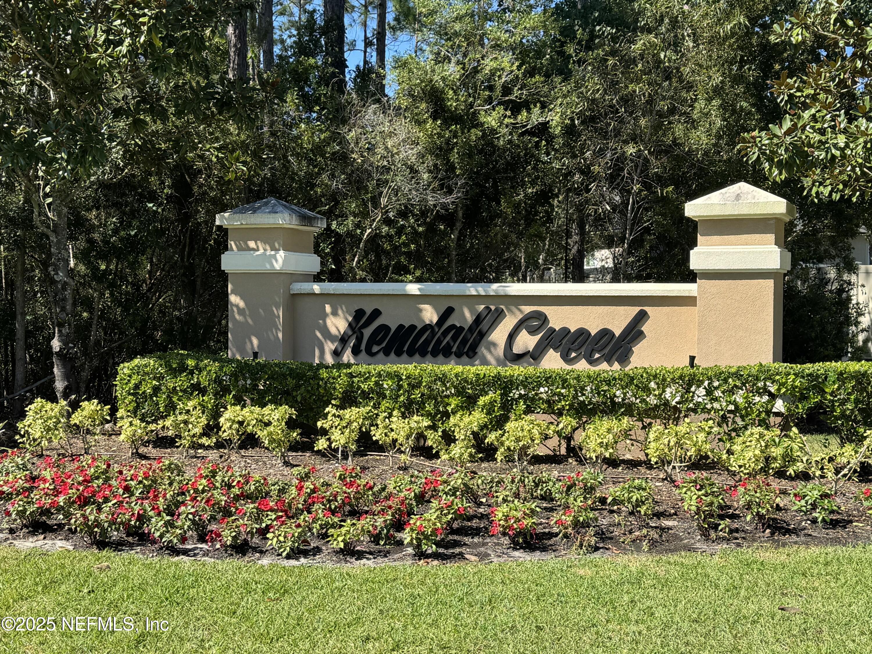45 Oban Court St. Johns, FL 32259 - Photo 51 of 53 a view of a sign in front of flowers