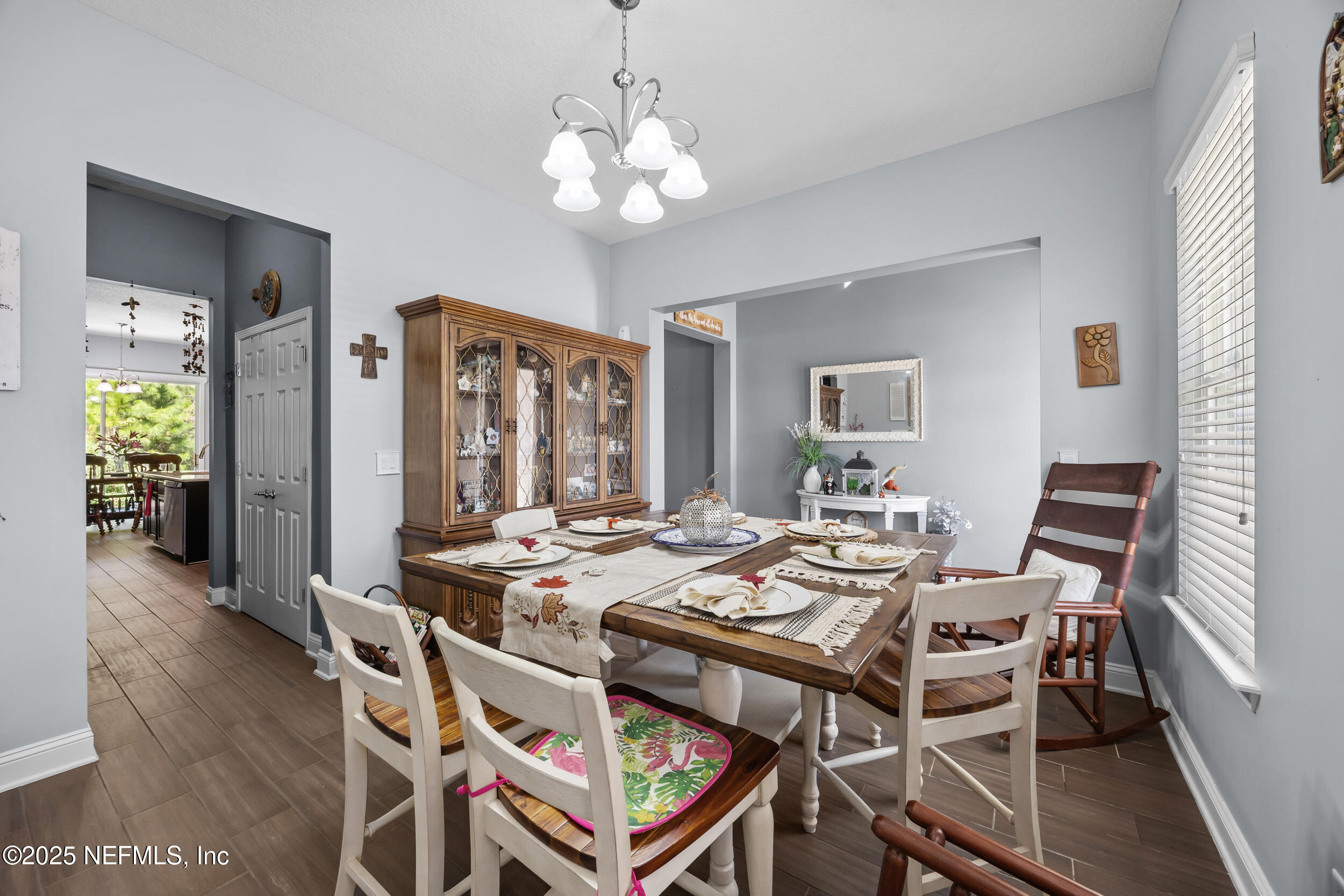 45 Oban Court St. Johns, FL 32259 - Photo 9 of 53 a view of a dining room with furniture and wooden floor