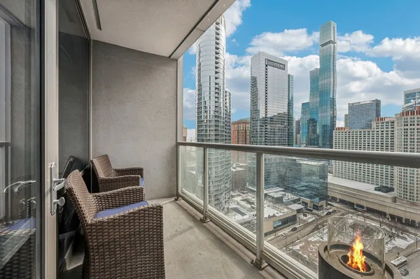 a balcony with furniture