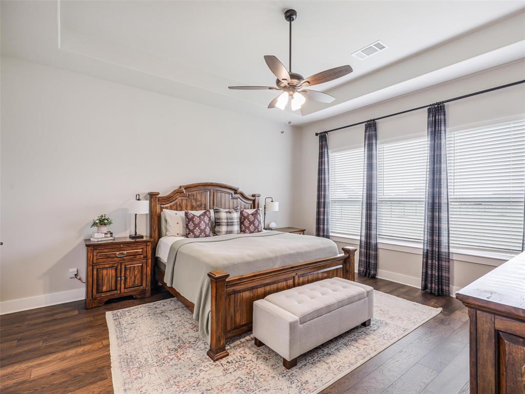 544 Majors Road Van Alstyne, TX 75495 - Photo 13 of 36 a bedroom with a bed mirror and window