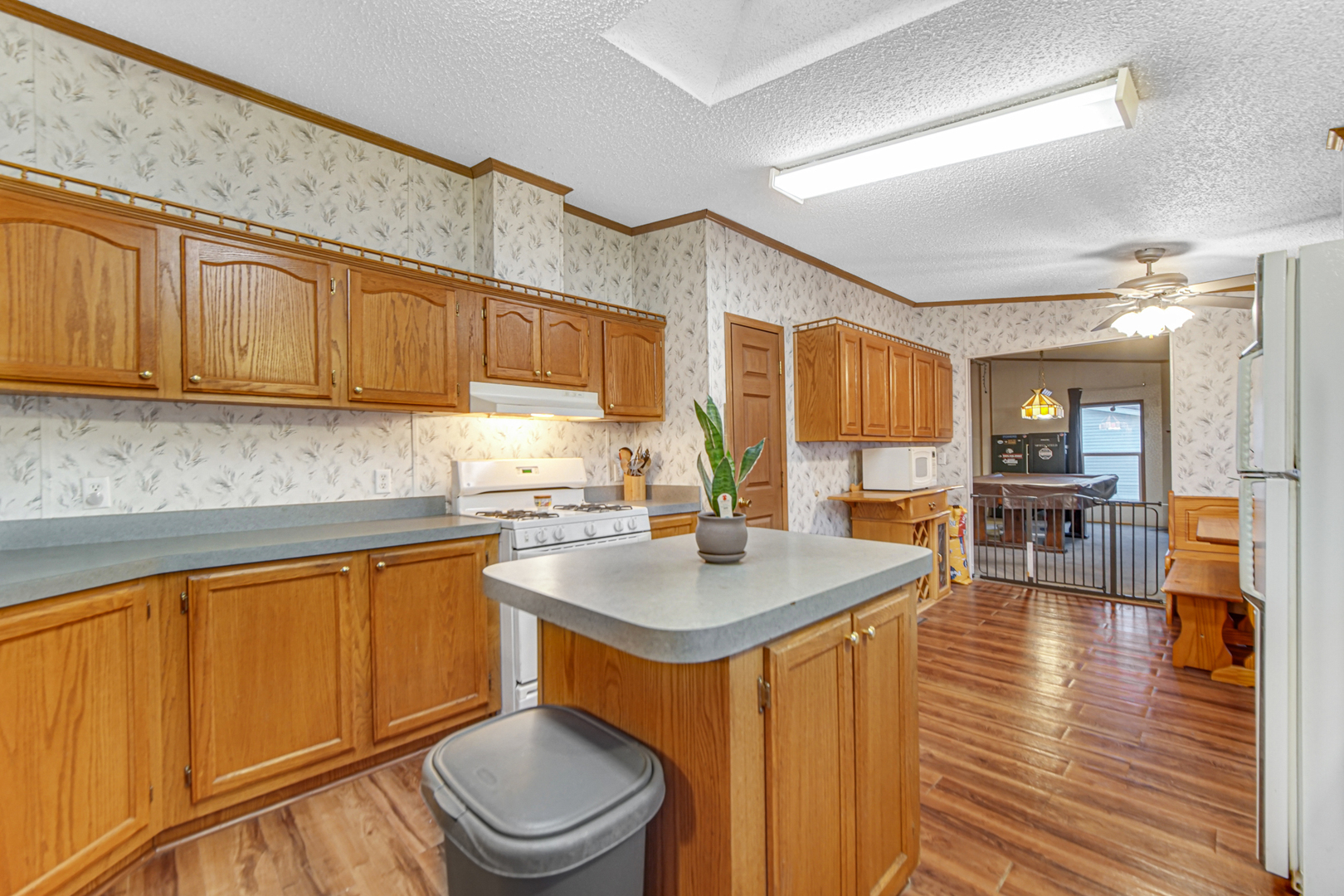 9 Swallow Lane Beecher, IL 60401 - Photo 16 of 24 a kitchen with a sink and cabinets