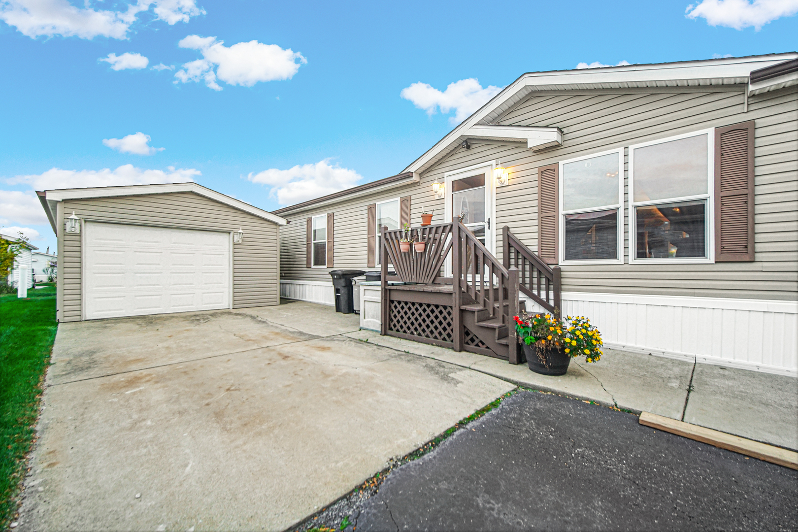 9 Swallow Lane Beecher, IL 60401 - Photo 2 of 24 a front view of a house with a garage