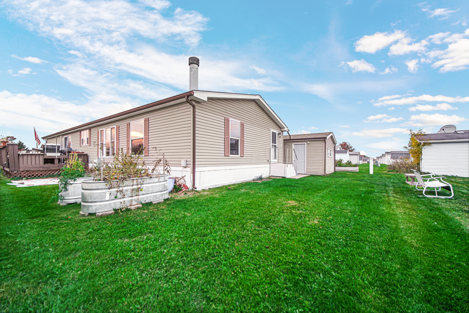 9 Swallow Lane Beecher, IL 60401 - Photo 22 of 24 a front view of a house with garden