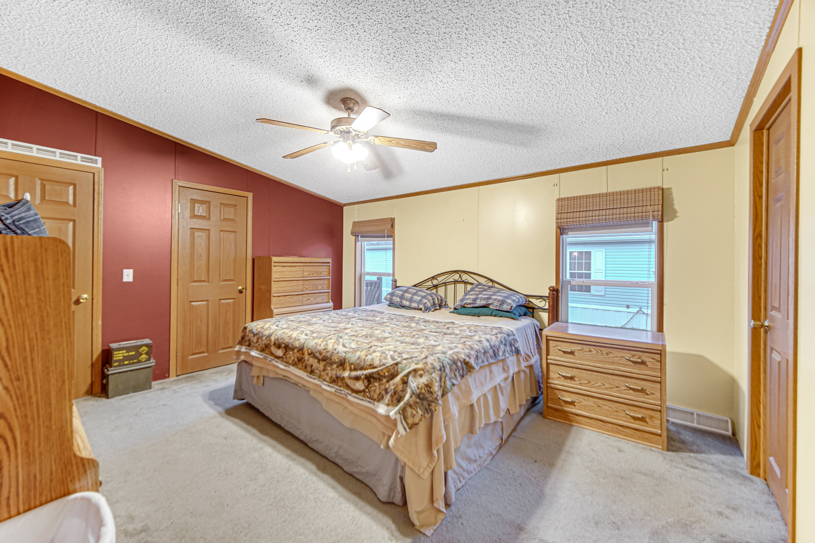 9 Swallow Lane Beecher, IL 60401 - Photo 8 of 24 a spacious bedroom with a bed and a chandelier