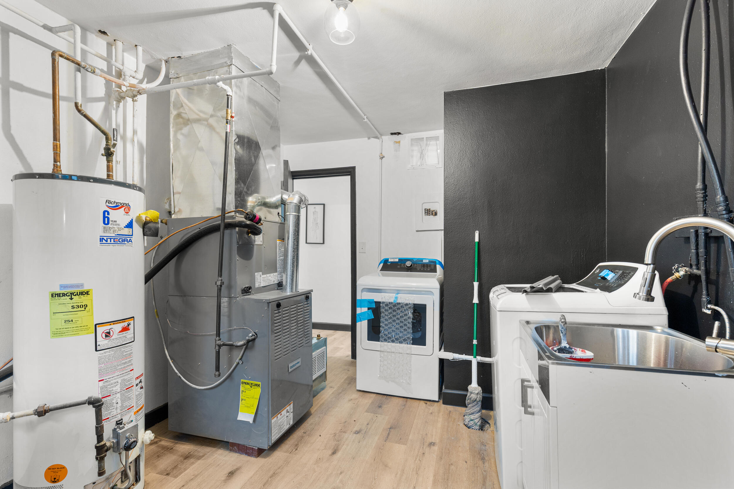 W156N8813 Pilgrim Road Menomonee Falls, WI 53051 - Photo 19 of 20 LAUNDRY ROOM