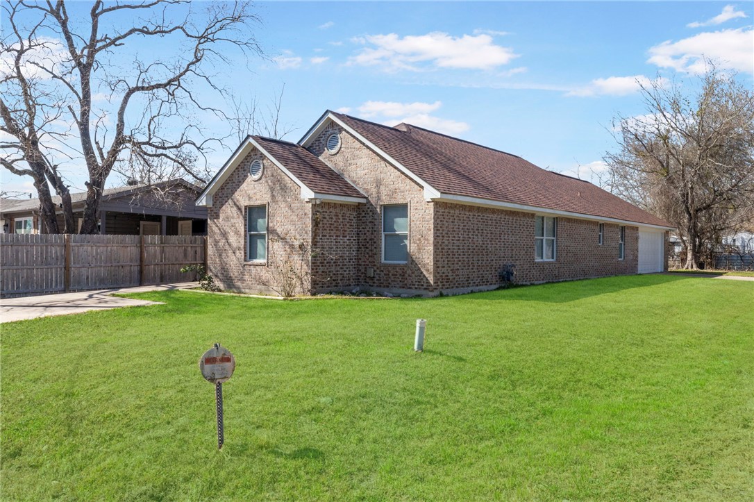 1508 Lopez Street Bryan, TX 77803 - Photo 1 of 1 a front view of house with a garden