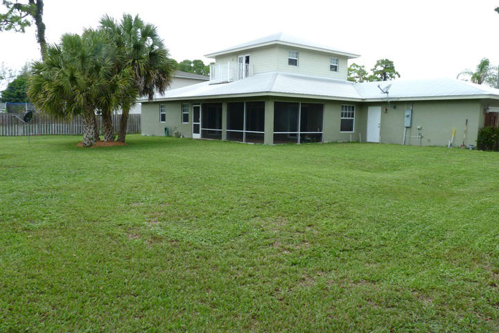 123 Springdale Road Lake Worth, FL 33467 - Photo 3 of 46 REAR FACADE
