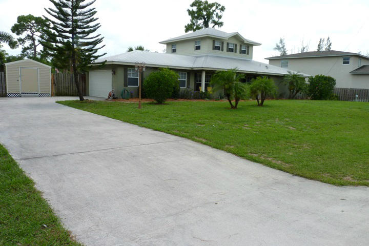 123 Springdale Road Lake Worth, FL 33467 - Photo 4 of 46 LONG DRIVEWAY