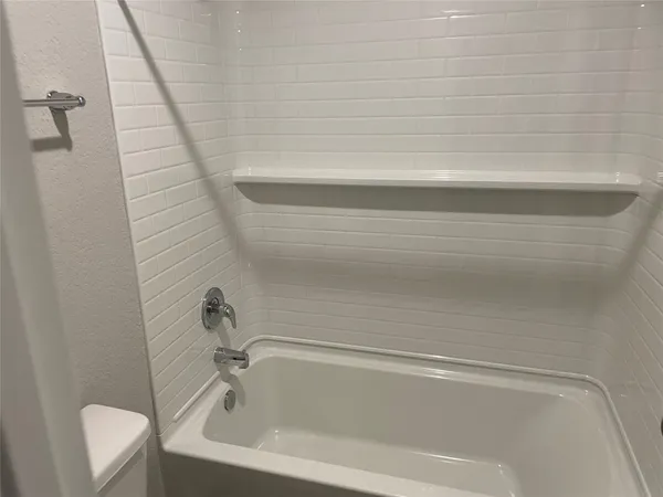 a bathroom with a bathtub