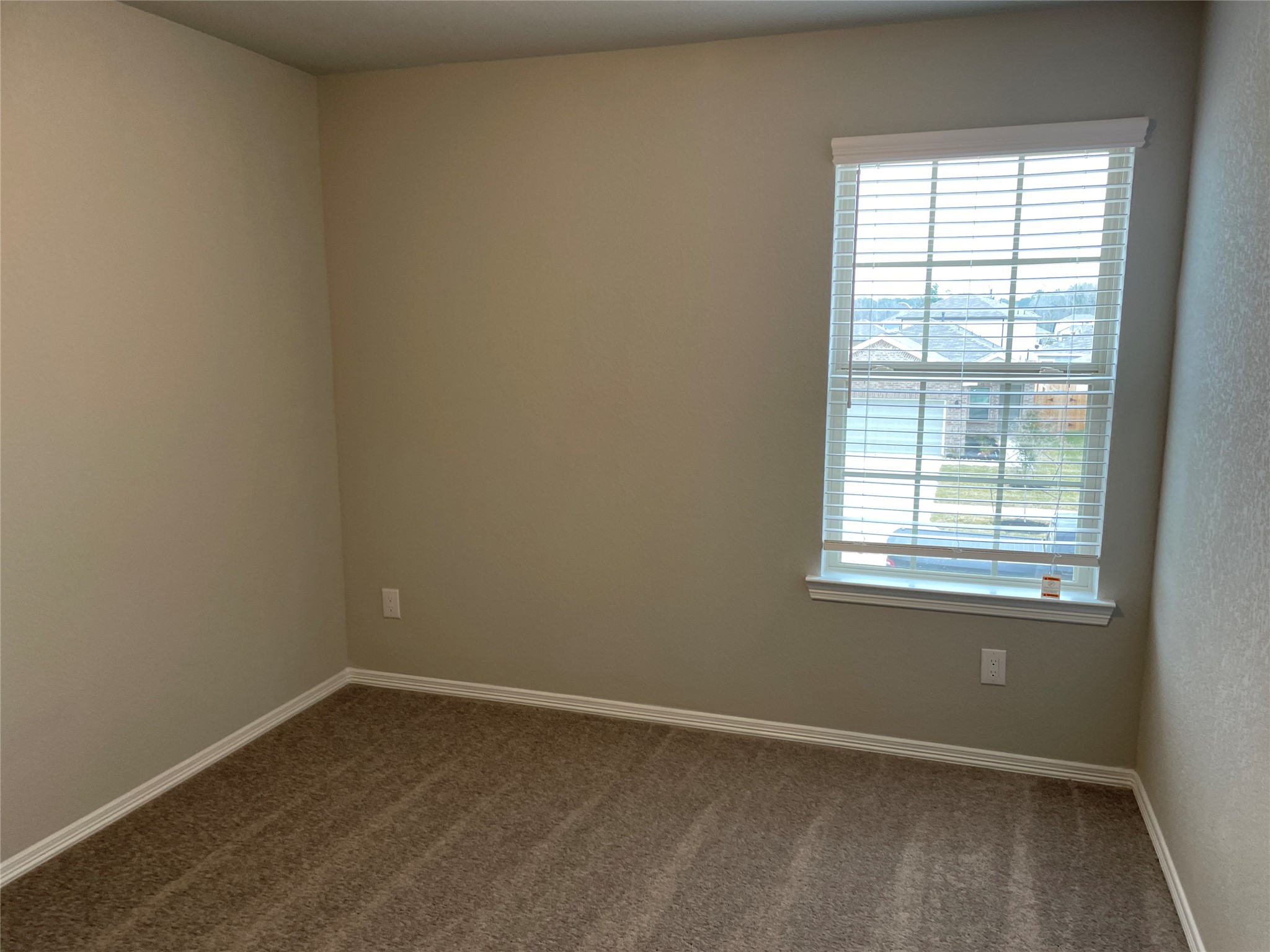 822 Redinger Ridge Drive Houston, TX 77336 - Photo 20 of 21 an empty room with a window