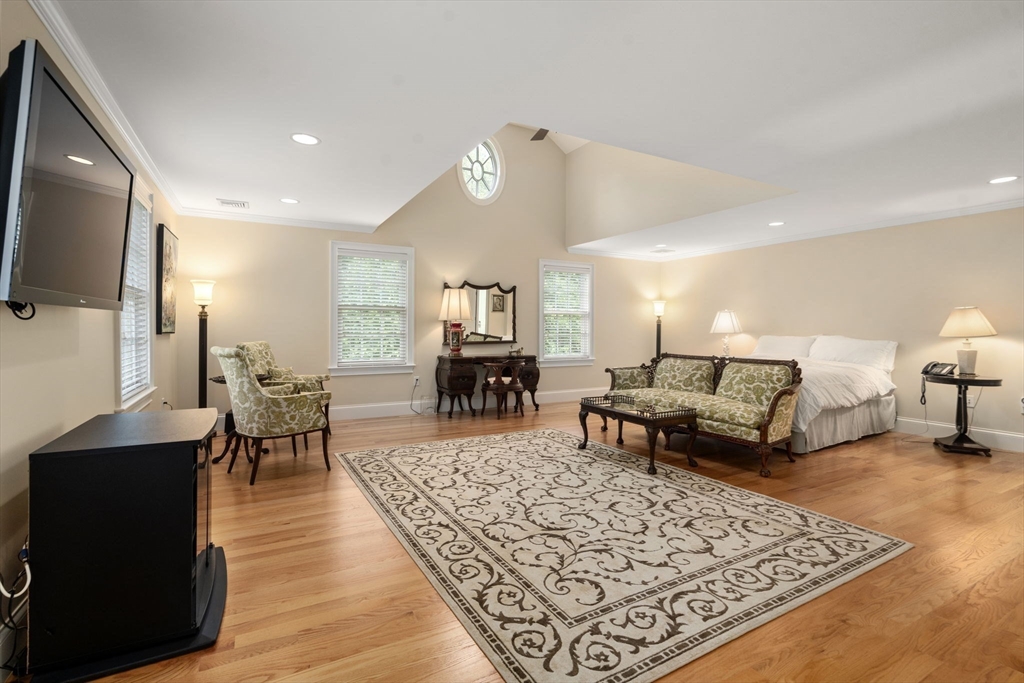 15 Rockport Road Weston, MA 02493 - Photo 13 of 20 a living room with furniture rug and a flat screen tv