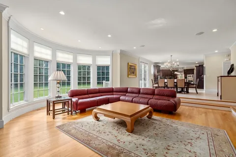 a living room with furniture and a table
