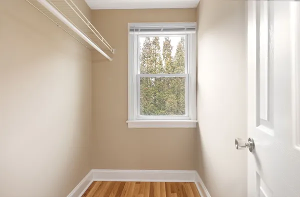 a view of a room with a window