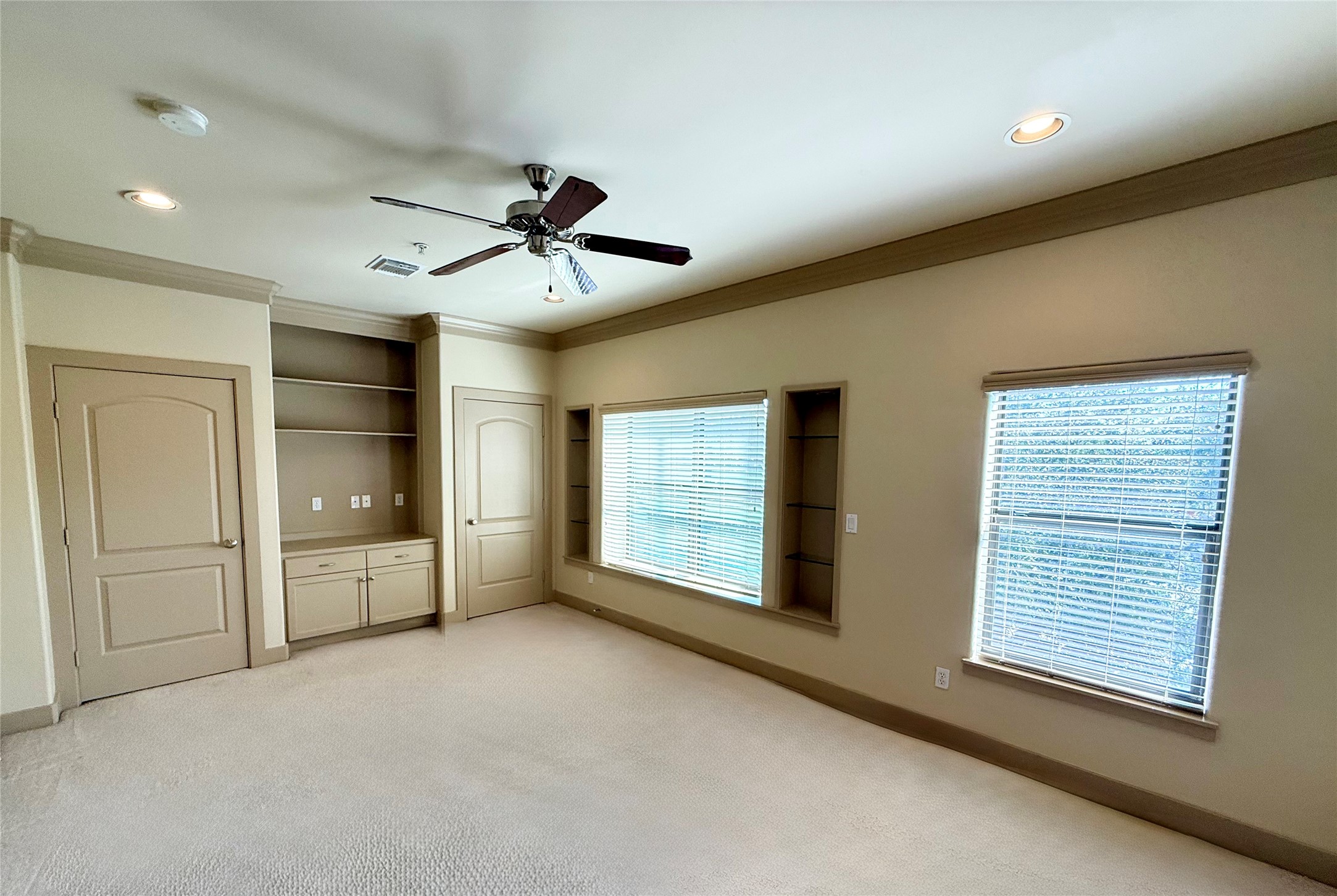 953 Yale Street, Unit 1 Houston, TX 77008 - Photo 15 of 24 a view of an empty room with a window and a kitchen