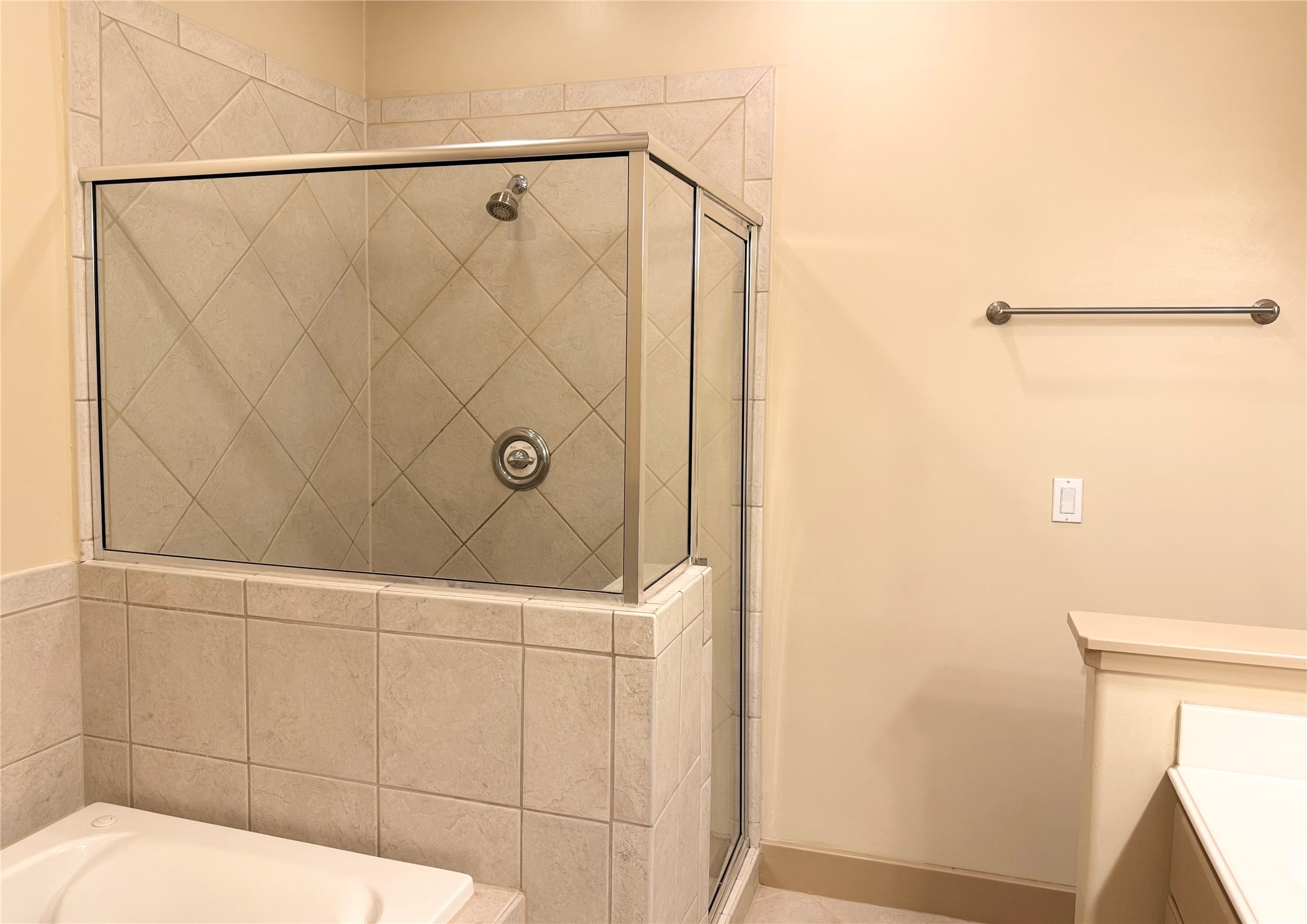 953 Yale Street, Unit 1 Houston, TX 77008 - Photo 18 of 24 a bathroom with a shower and a mirror