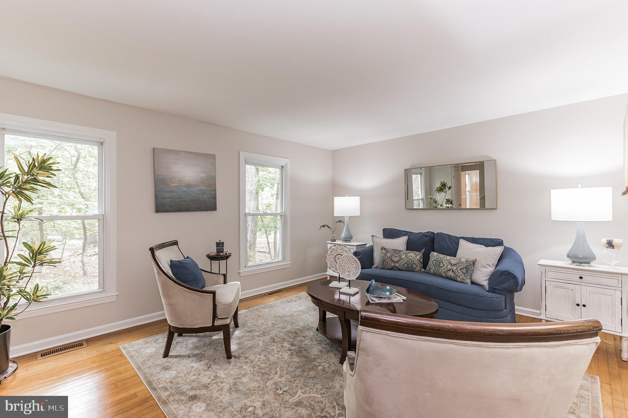 Natural light streams in the formal living room