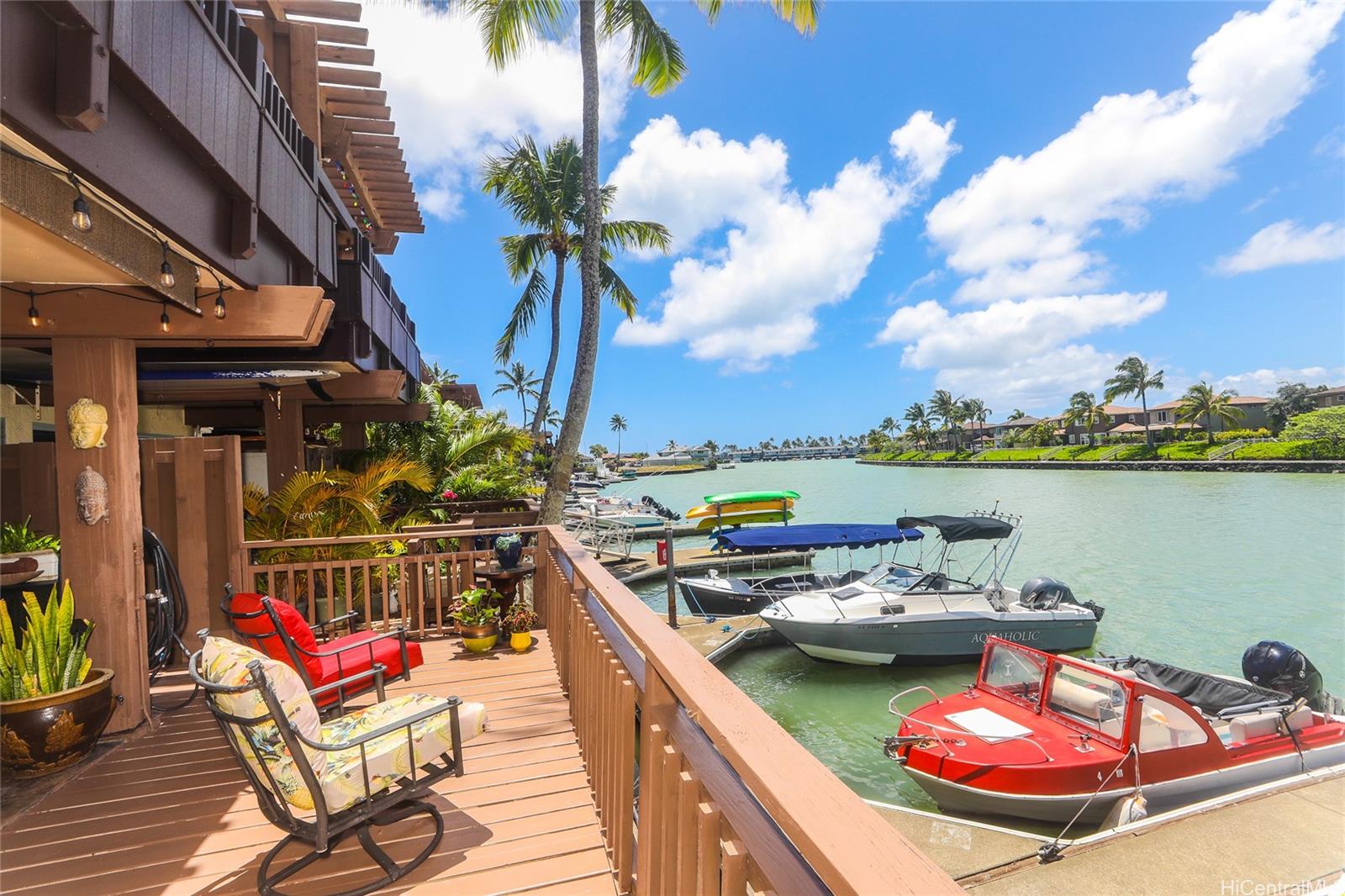 a view of a balcony with lounge chair