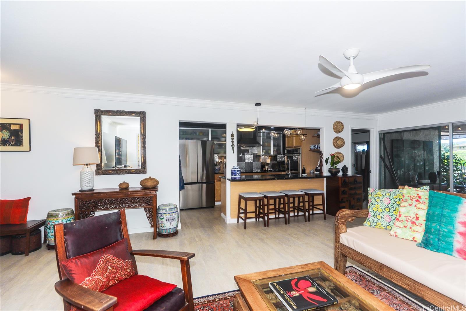 444 Lunalilo Home Road, Unit 312 Honolulu, HI 96825 - Photo 11 of 25 a living room with furniture and a large window