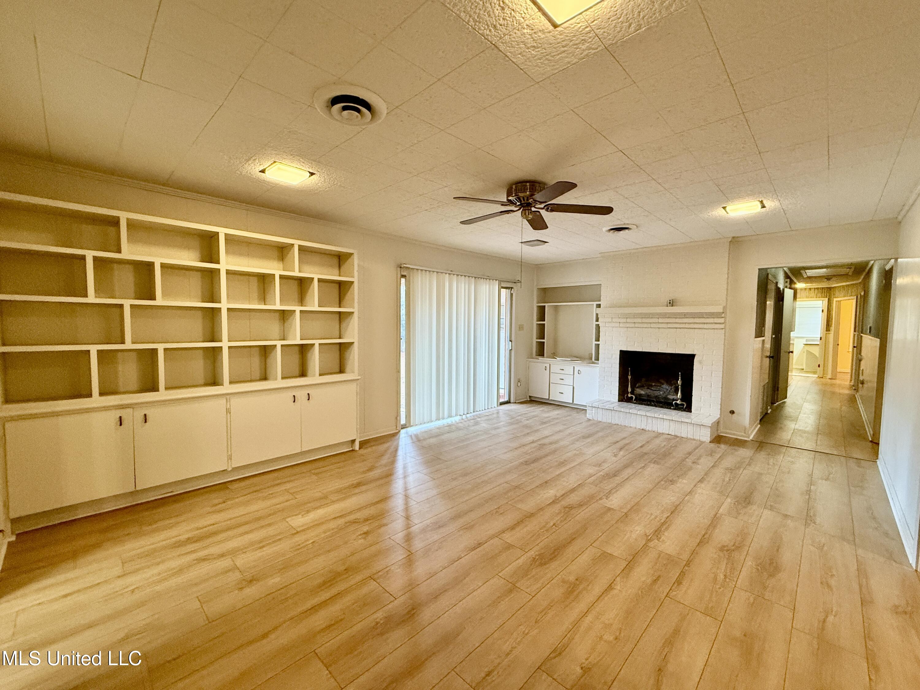 1107 Kraner Lane Brookhaven, MS 39601 - Photo 15 of 46 Built-in Bookcase & Gas Fireplace